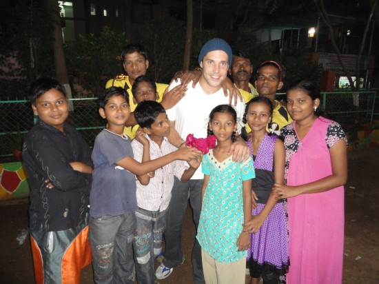 Kane Ryan with the people of Saki Naka slum