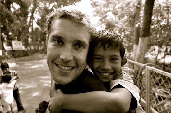 Kane Ryan and a young friend in Bombay