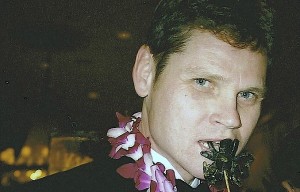George Burden eating Tarantula on a Stick at the Explorer's Club