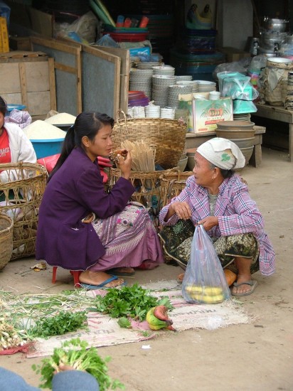 Laos: Luang Prabang market young meets old 