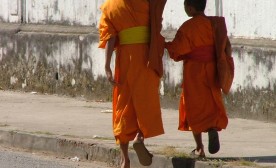 Laos Luang Prabang youn g monks on the way to the monastery