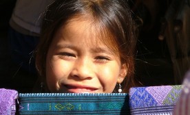 Laos Mekong River A Lao Lue girl in the village of Khon Toune by Vincent Ross