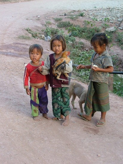 Laos Mekong River children in the village of Pakbeng by Vincent Ross