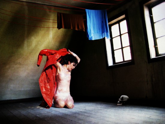 Woman half dressed