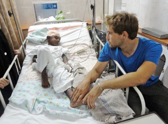 A young boy in ICU in India, with Kane Ryan of Dirty Wall Project