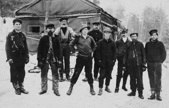 Dr. Norman Bethune. Victoria Harbour Lumber Co., Martin's camp. Dr. Bethune is standing straddle legs with hands on hips, 1911 Lake Ontario Dr. Norman Bethune. Victoria Harbour Lumber Co., Martin's camp. Dr. Bethune is standing straddle legs with hands on hips, 1911 Lake Ontario