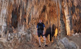 Author Geoge Burden, exploring the underground caverns of the Yucatan Peninsula.