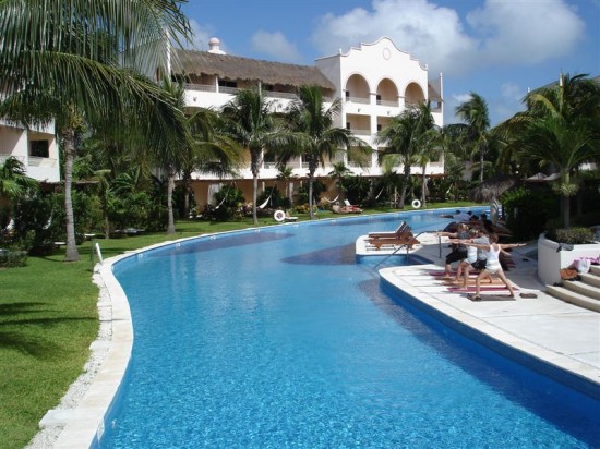 Exercise class by meandering pools