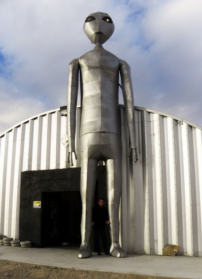 The "Alien Research Station, actually a gift store with a science fiction bent in Rachel, Nevada, near Area 51.  Note author between alien's knees.
