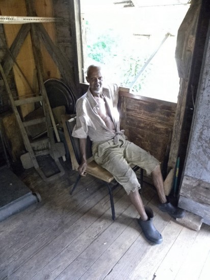 Elderly gent at nutmeg plantation