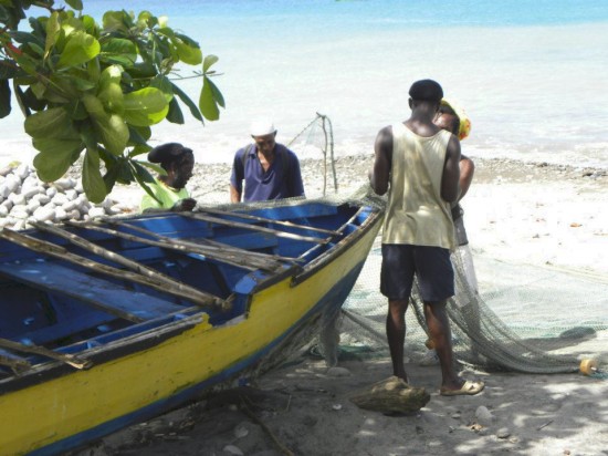 Fishermen mending nets