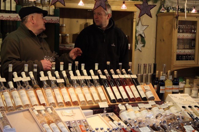 Selling locally produced wine at the Schonbrunn Palace Christmas – New Years Market, Vienna.