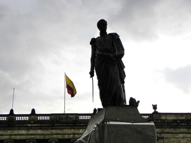 Statue of Simon Bolivar, South America's liberator with Colombian flag and National Capitol behind