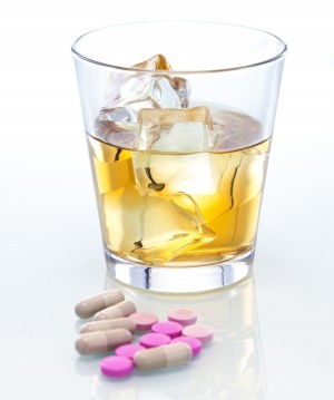 Whiskey and several prescription medications.