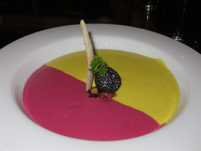 Two tone beet and curried fruit soup