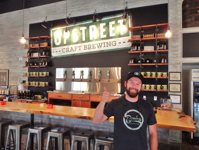 Joey Seaman giving a tour of the Upstreet Taproom