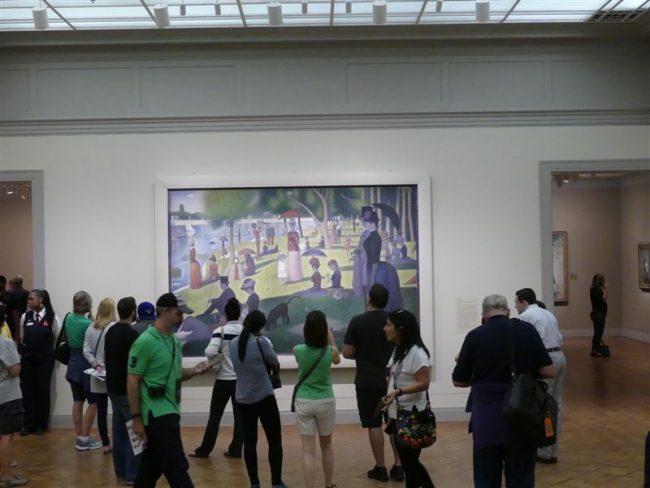Admiring Seurat's masterpiece
