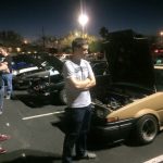 At a car meet, admiring the scenery.